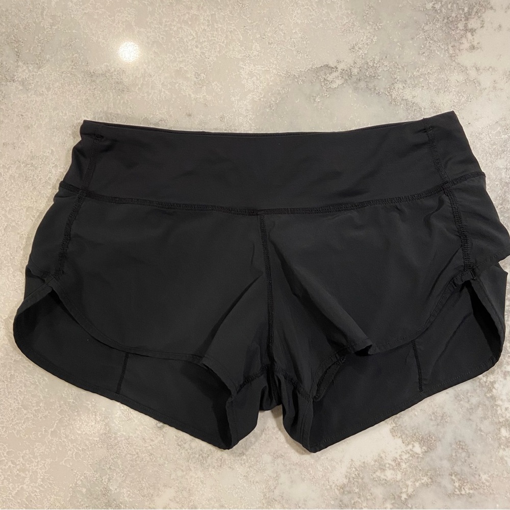 Lululemon skort black zip pocket  size 4 Pickleball  Gym Jogging “Wet Dry Warm”